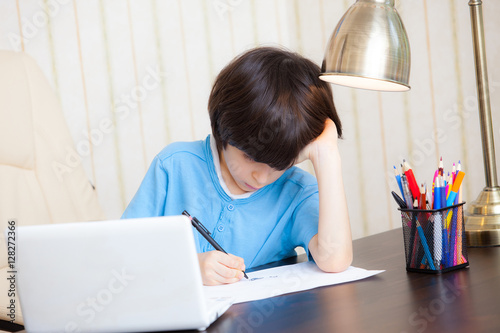 schoolboy doing homework