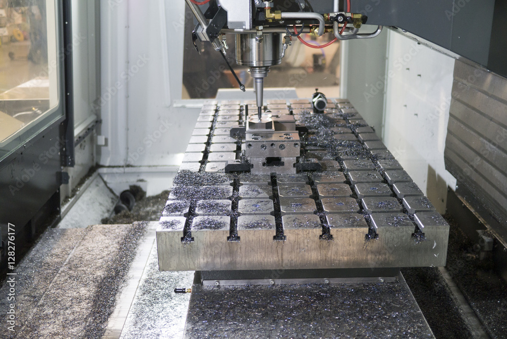 Processing part in Milling CNC machine with face mill in spindle Processing part in Milling CNC machine with face mill in spindle