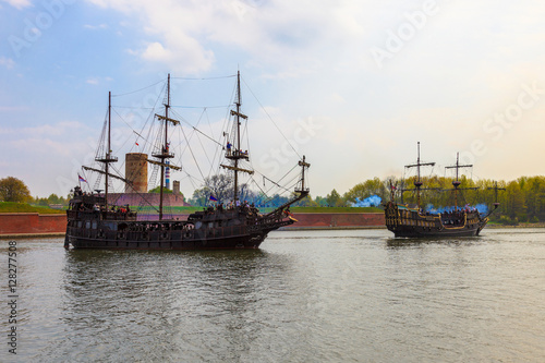 Armed galleons attacking the fortress Wisloujscie in Gdansk, Poland.