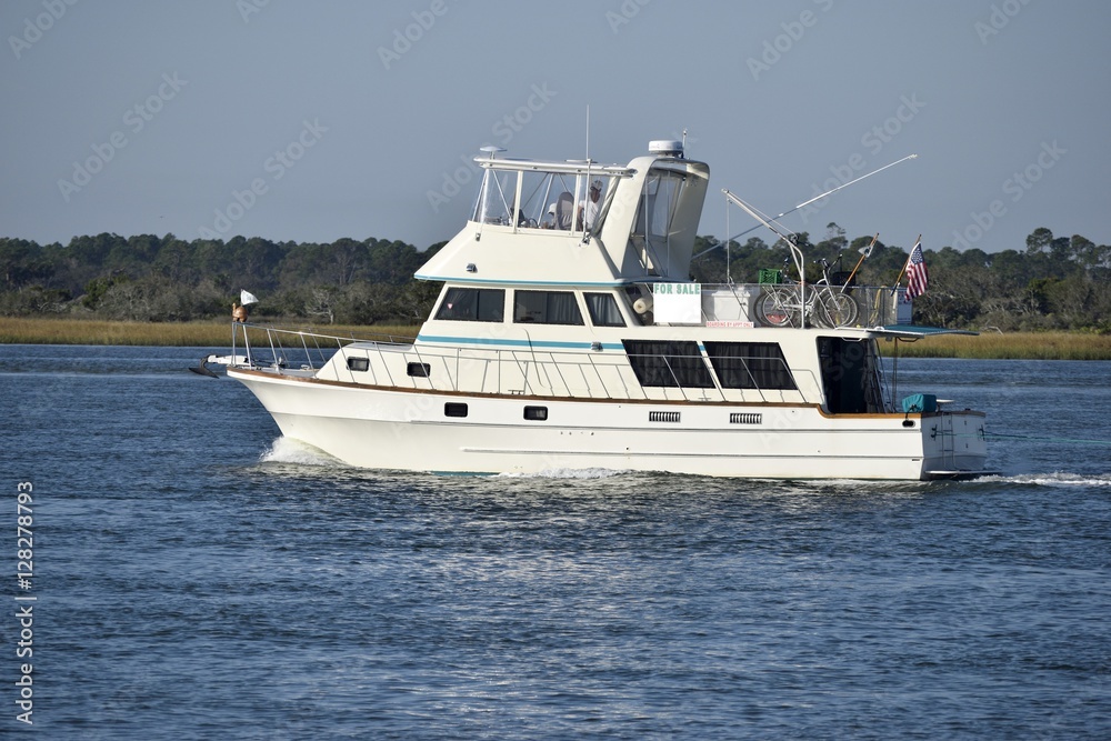 Boat cruising along the river at Florida, USA Boat cruising along the river at Florida, USA