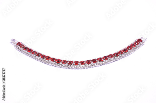 gold bracelet with rubies isolated on white