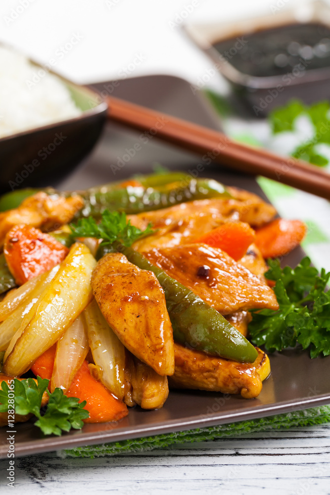 Chicken and Rice with Spicy Sesame Teriyaki Wok Sauce. Selective focus. Chicken and Rice with Spicy Sesame Teriyaki Wok Sauce. Selective focus.