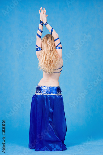 Beautiful belly dancer in motion