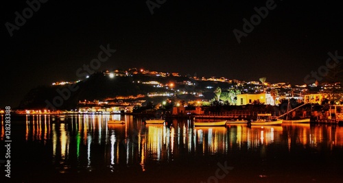  The lake of Miseno at night with suggestive reflections of light , Bacoli, Naples, Italy 
