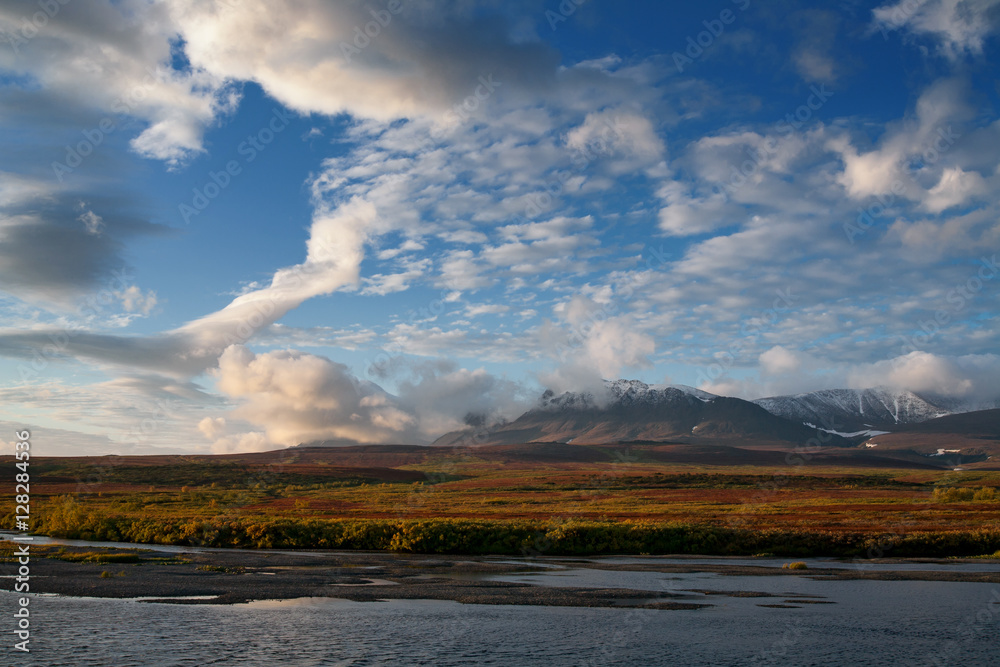 Beautiful clouds over the mountains autumn. Rai-Iz massif. Polar Urals. Russia.