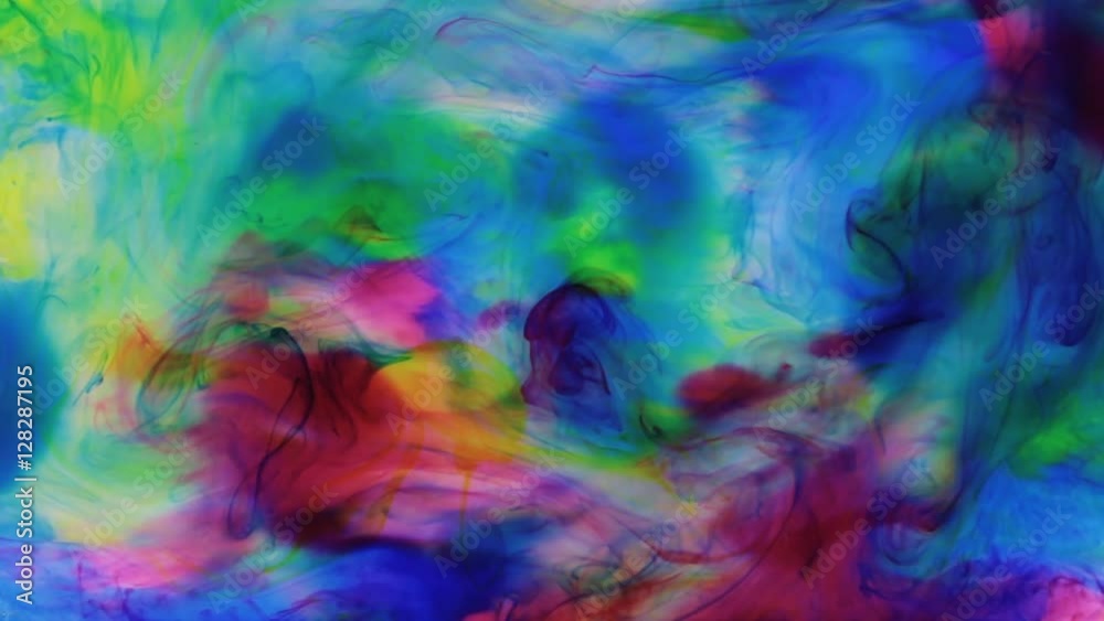 Beautiful colorful ink in water, ink drop. Zoom multi colored ink dissolved in water. Beautiful colorful ink in water, ink drop. Zoom multi colored ink dissolved in water.