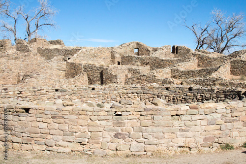 Ruin of a kiva and buildings at the abandoned ancestral Pueblo settlement in Aztec  NM