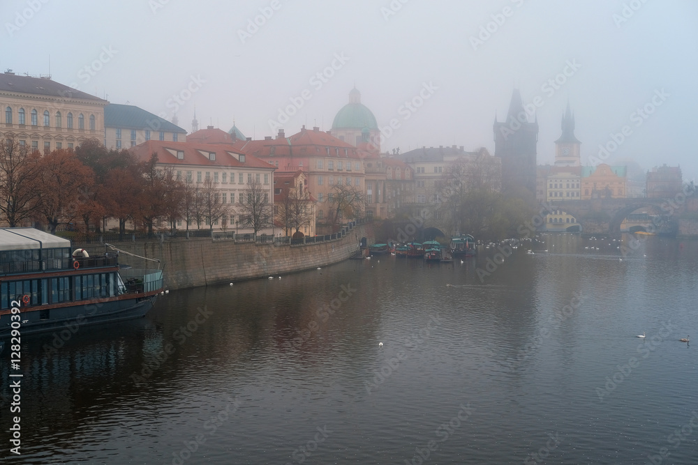 Prague, Czechia - November, 21, 2016: morning fog on Vltava river in Prague, Czechia.