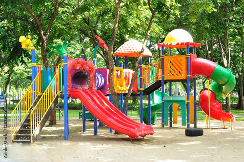 Colorful playground equipment for children in public park.