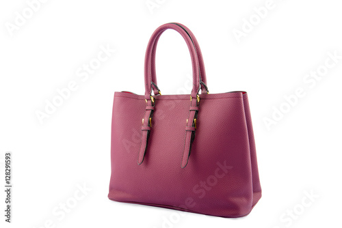 Magenta female leather bag isolated on white background.