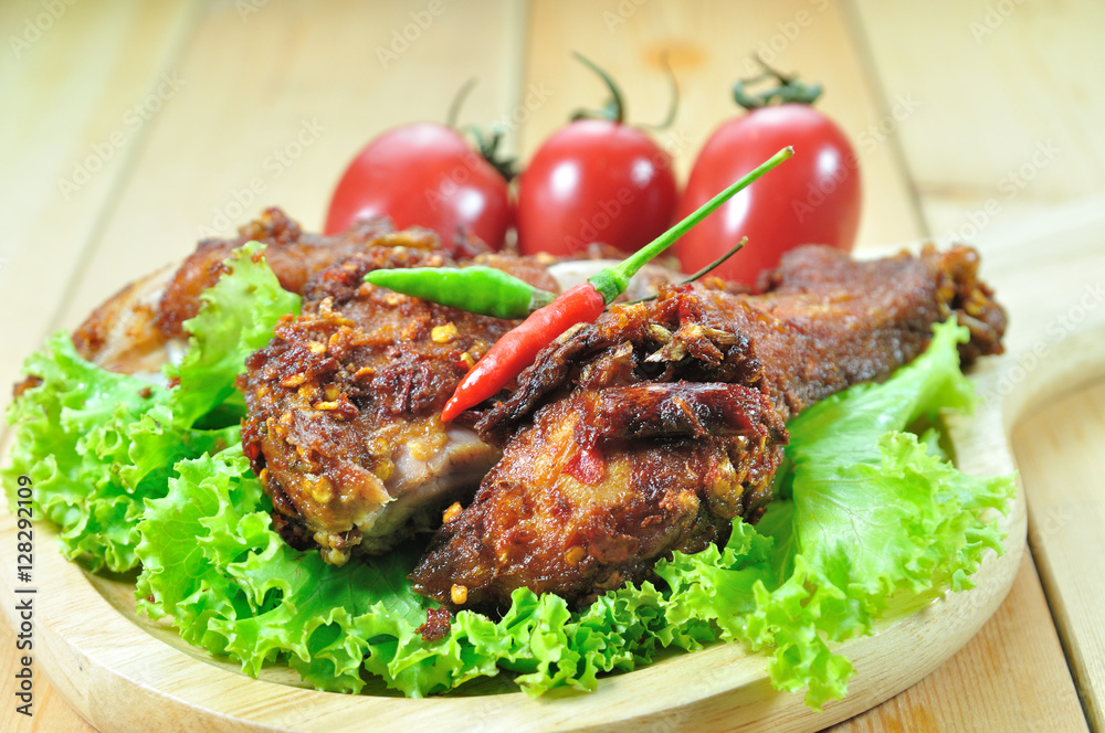 Fried chicken with seasoning set up on table, food stylist Fried chicken with seasoning set up on table, food stylist