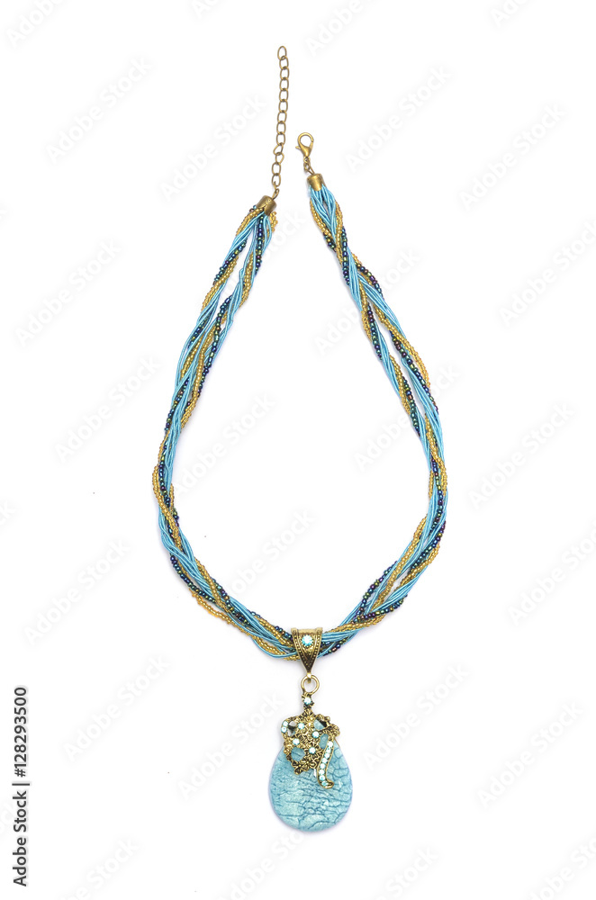 Pendant with blue stone isolated on white Pendant with blue stone isolated on white
