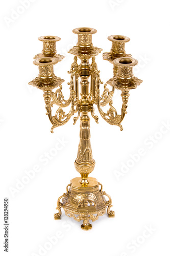 Vintage golden candlestick on white background