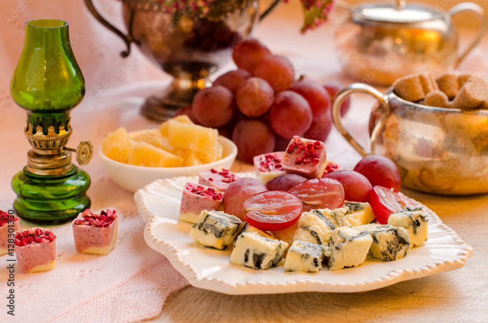 Cheeses, fruits and desserts. Beautiful set-up. Cheeses, fruits and desserts. Beautiful set-up.