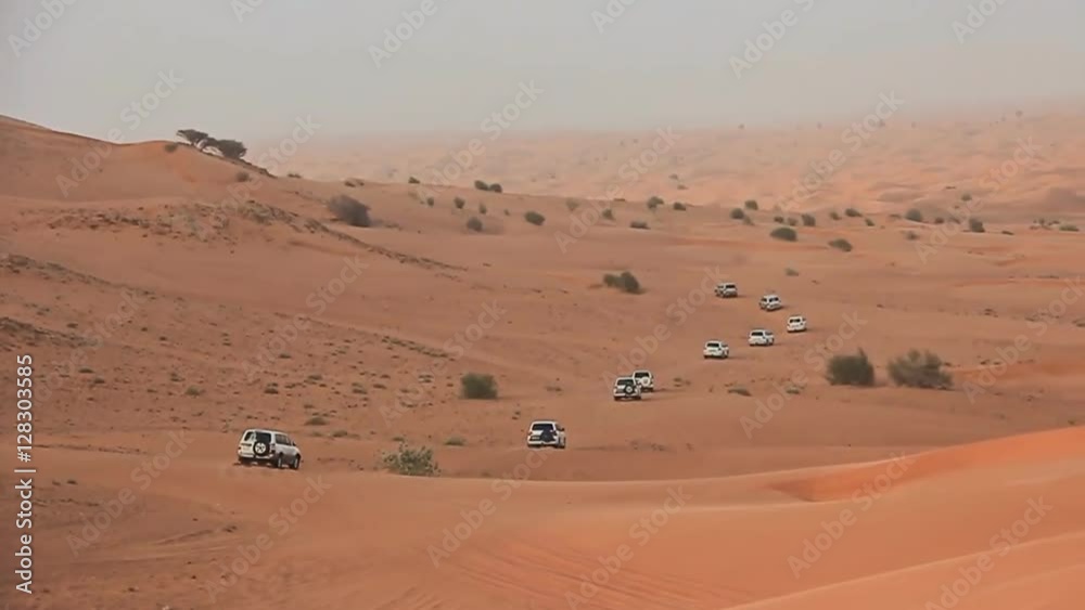 Desert Safari SUVs bashing through the arabian sand dunes 4 Desert Safari SUVs bashing through the arabian sand dunes 4