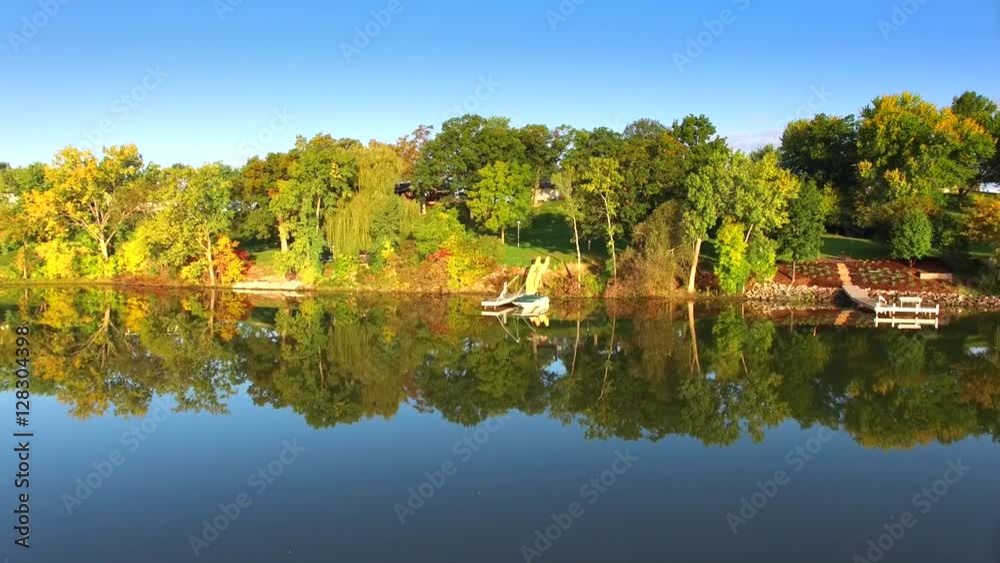 Aerial Flyover of Colorful Autumn Foliage at Picturesque Rivers Edge
Aerial Flyover of Colorful Autumn Foliage at Picturesque Rivers Edge