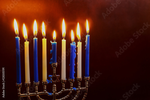Jewish Holiday Hanukkah background with menorah