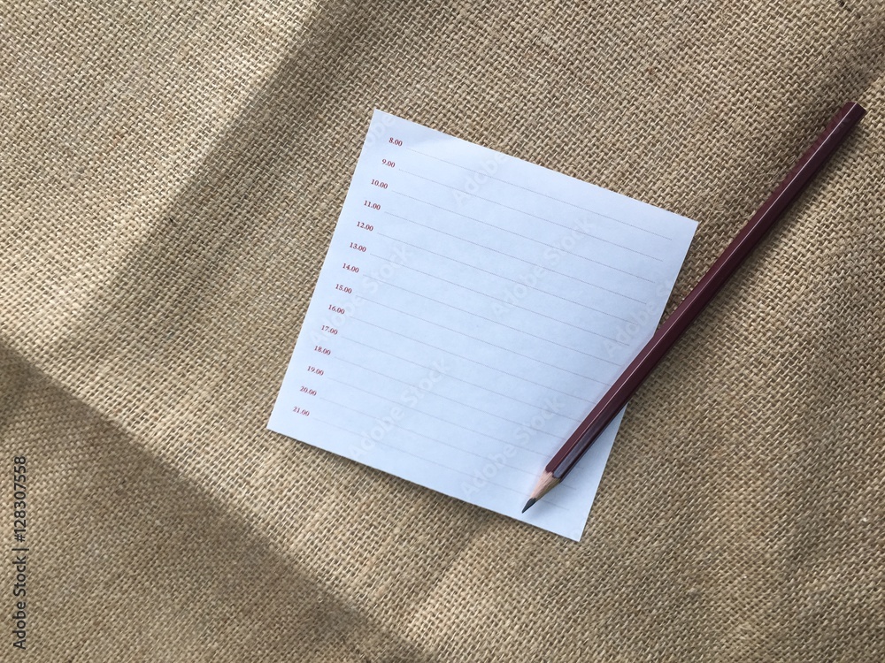 Fototapeta premium Note paper and pencil on sackcloth