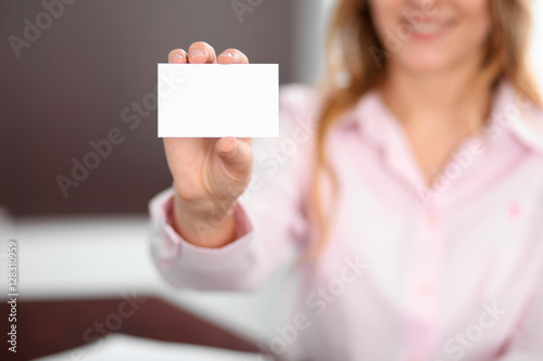 Business woman giving visit card © rogerphoto