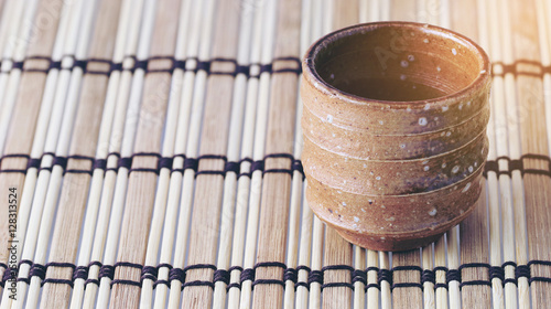 a sake cup, hot tea cup