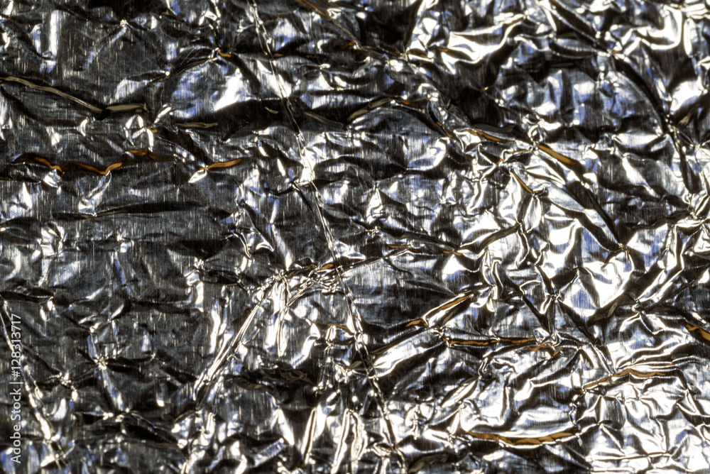 Crumpled Aluminum Tin Foil Surface Background Crumpled Aluminum Tin Foil Surface Background