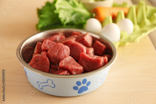 Fototapeta Naklejka Na Ścianę i Meble -  Healthy dog food on wooden background