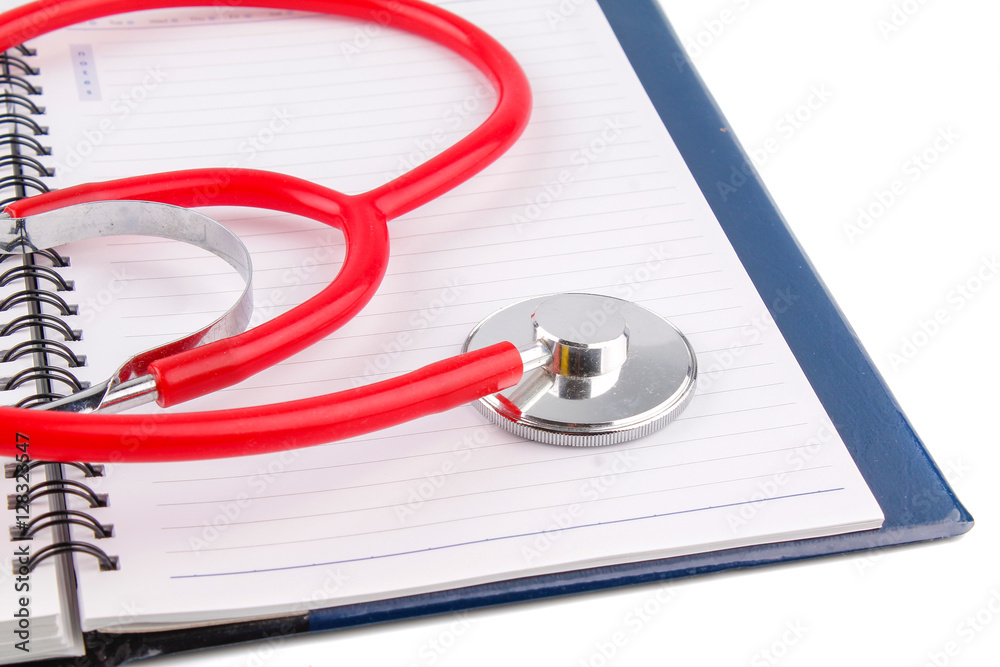 Medical concept. Stethoscope and open notebook on white background Medical concept. Stethoscope and open notebook on white background