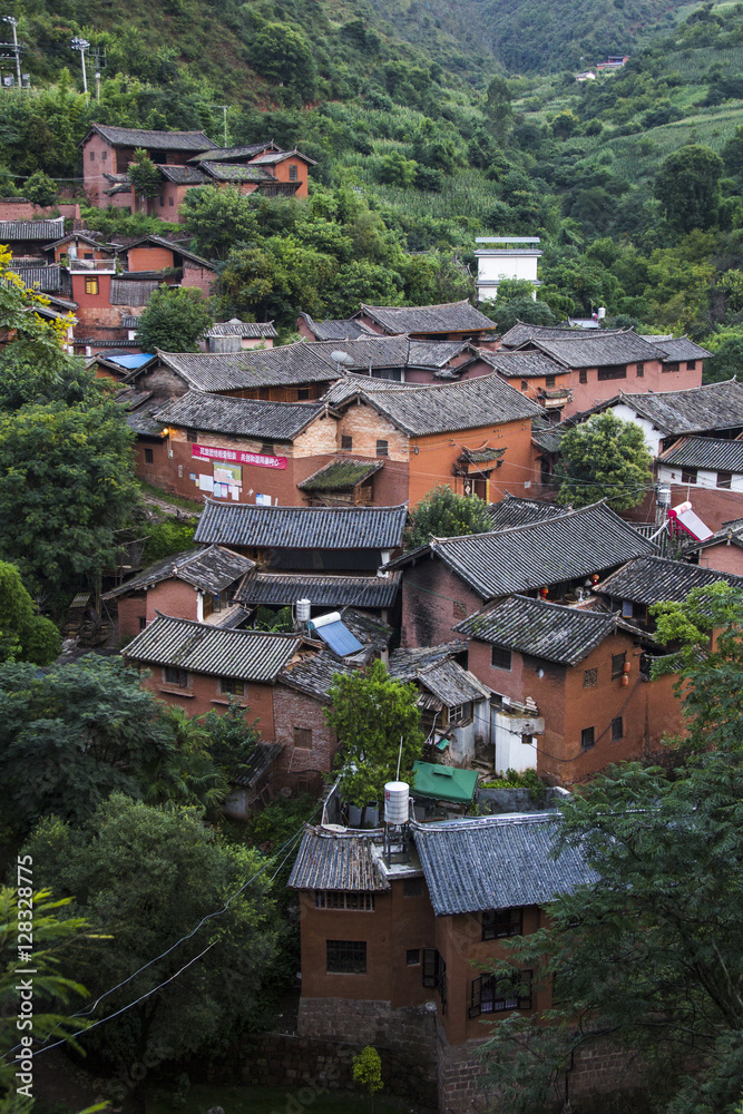 chinese village with traditional houses in yunnan