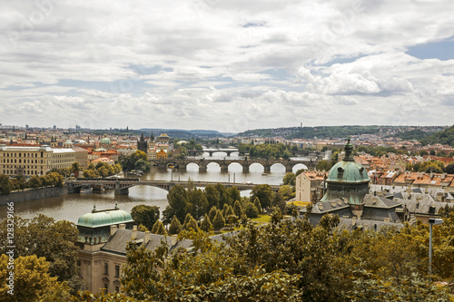 view of bridges on the Vltava river and of the historical center of Prague
