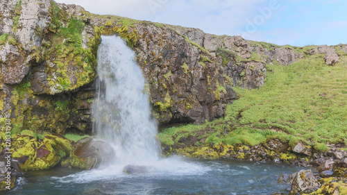 Kirkjufellsfoss waterfall near the Kirkjufell mountain