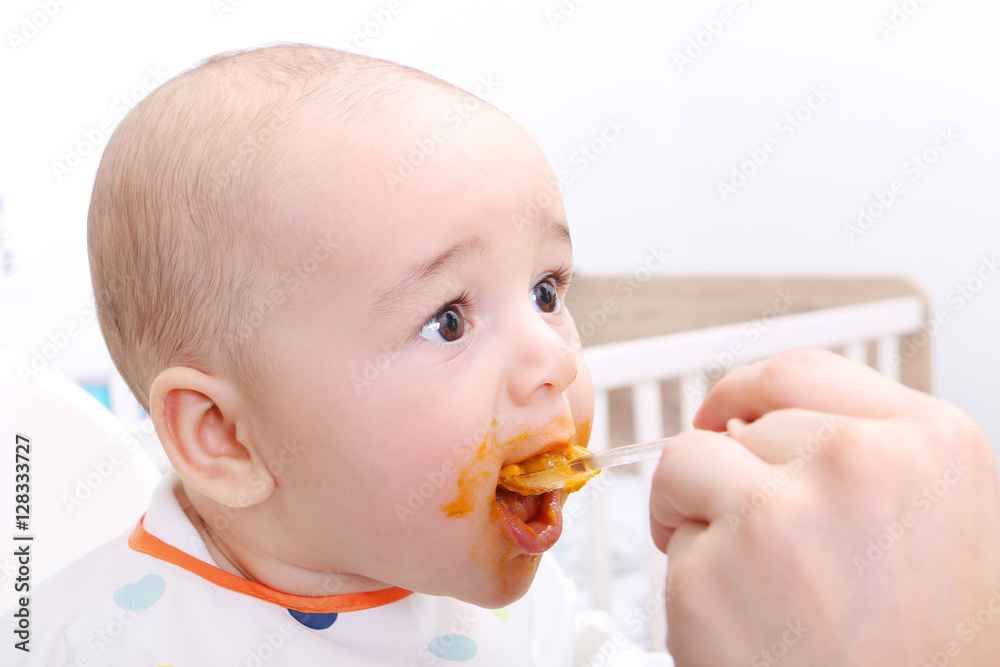 Feeding a baby boy Feeding a baby boy