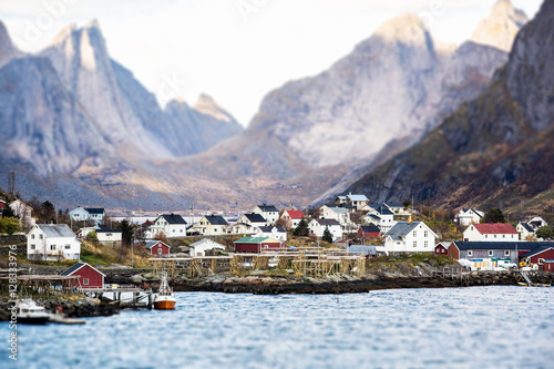 Scandinavian village in miniature. Panorama of the town. Small houses, boats. Coast Sea. Tilt shift effect. Europe.