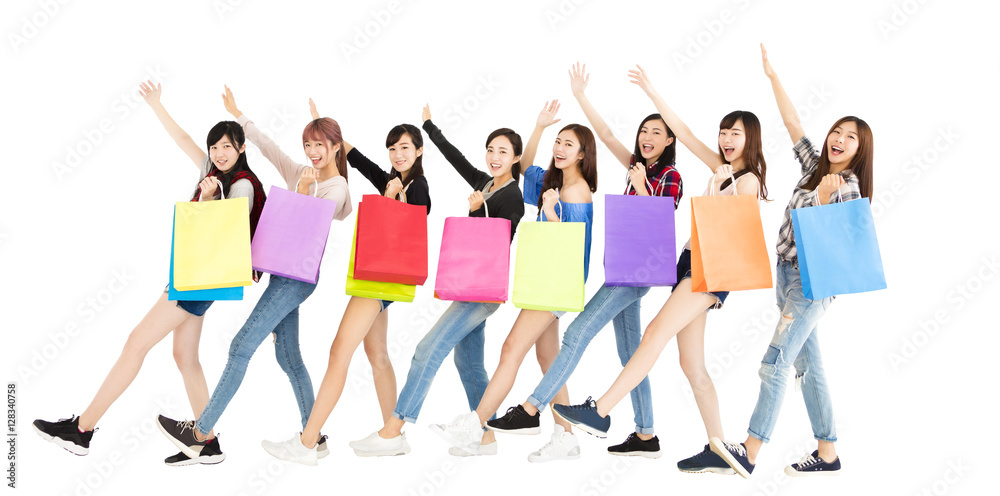 Obraz premium Happy young woman group enjoy shopping