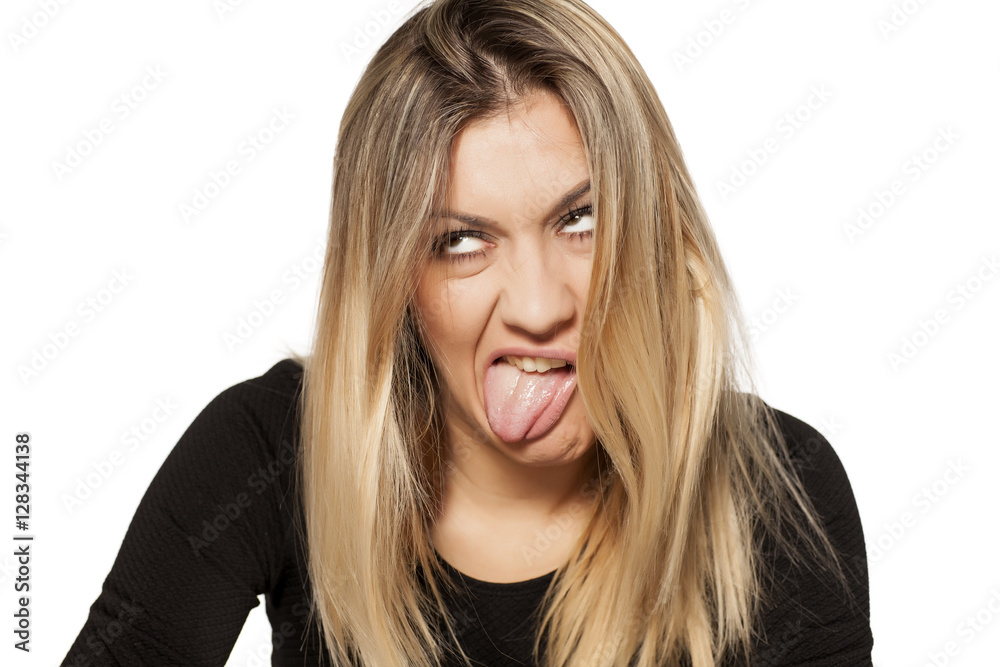 silly young woman making ugly faces silly young woman making ugly faces