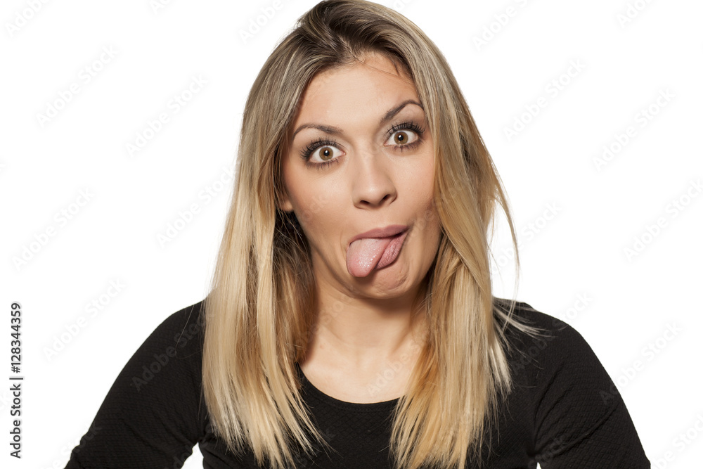 silly young woman making funny faces silly young woman making funny faces