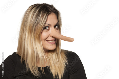 Canvas Print smiling young woman with elongated nose. concept of lying