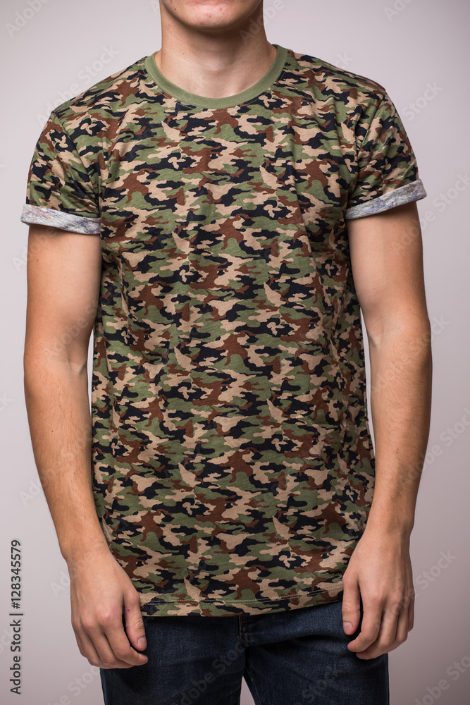 Obraz premium Front t-shirt on a young man isolated