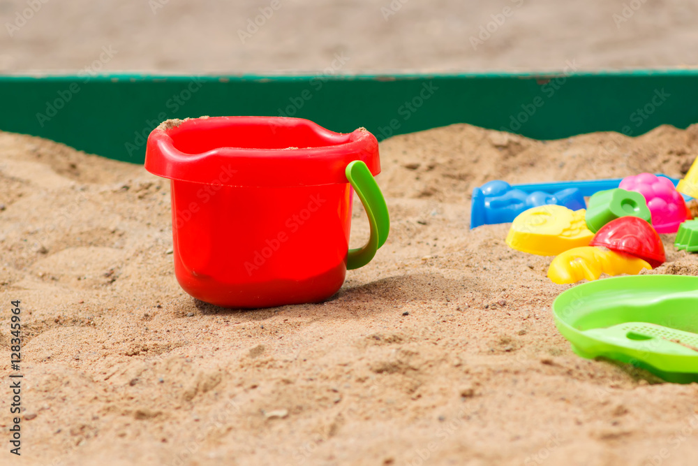 bucket and molds in the sandbox bucket and molds in the sandbox