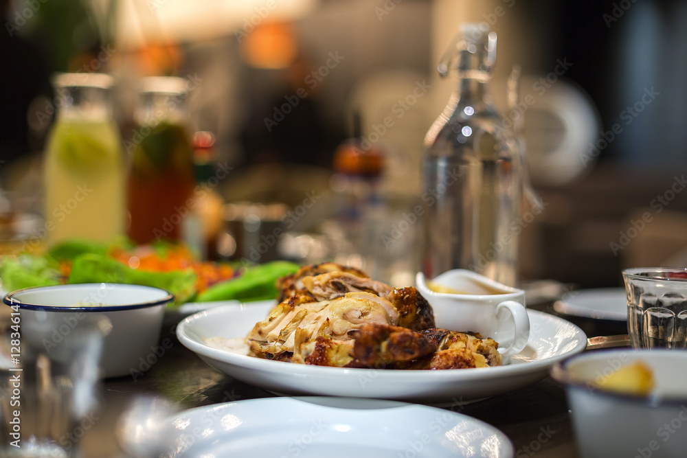 roast chicken display on table restaurant. Selective focus, shallow depth of field.