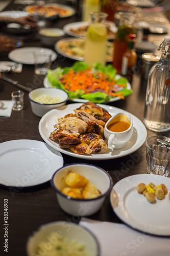 roast chicken display on table restaurant. Selective focus, shallow depth of field.