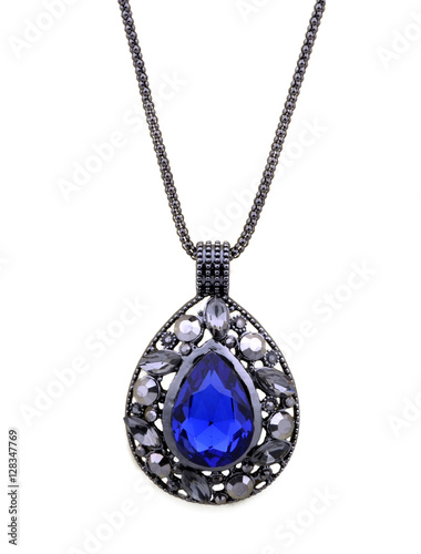 Blue pendant on a chain on a white background