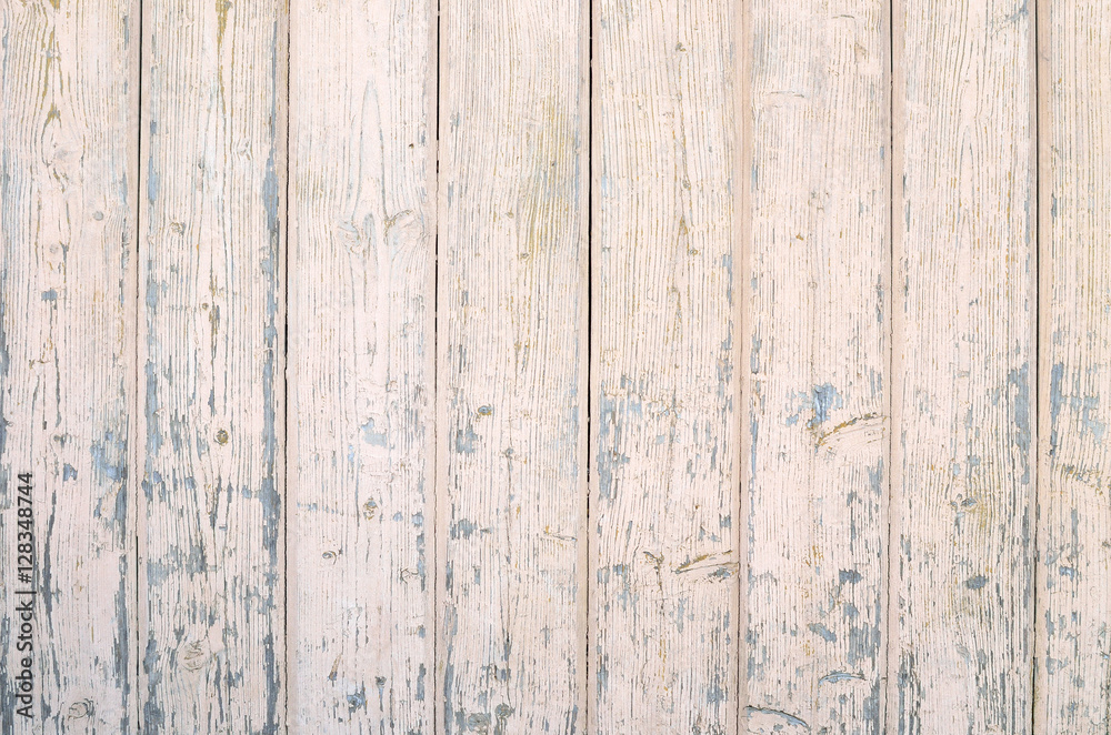 Texture of old beige boards with flaking gray paint Texture of old beige boards with flaking gray paint