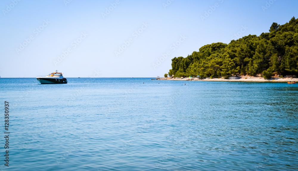 Obraz premium A yacht near in a creek by the coast of Croatia
