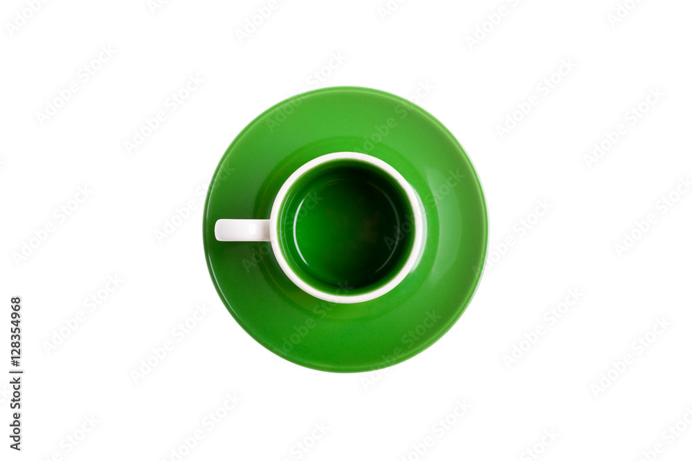 White ceramic cup on a green saucer, top view