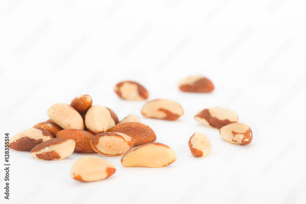 Brazil nuts on white background. Bertholletia excelsa. Healthy food. Brazil nuts on white background. Bertholletia excelsa. Healthy food.