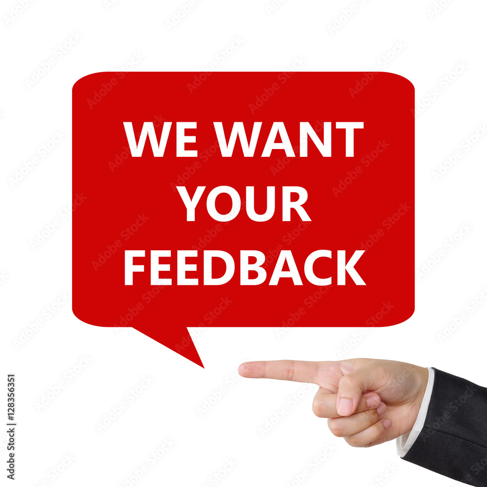 Businessman hand pointing we want your feedback on bubble speech Businessman hand pointing we want your feedback on bubble speech