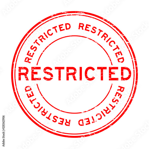 Grunge red restricted round rubber stamp on white background