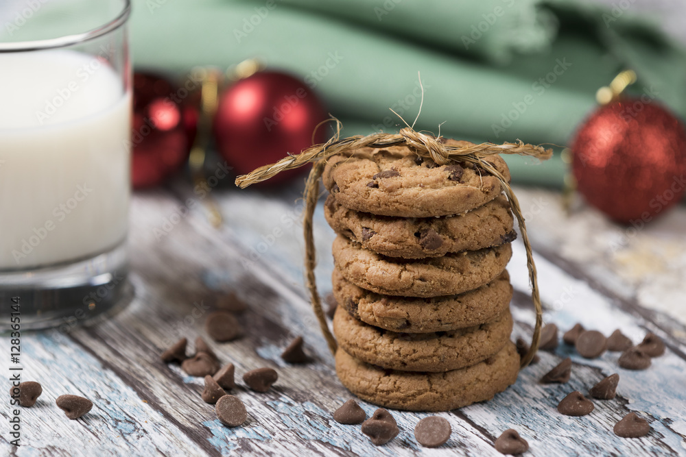 Cookies and Milk for Santa / Cookies and milk with Christmas decoration on a wooden background Cookies and Milk for Santa / Cookies and milk with Christmas decoration on a wooden background