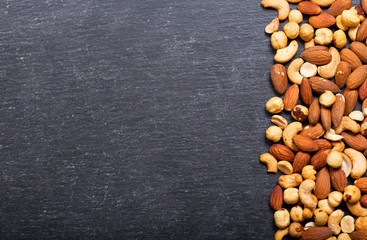 mixed nuts on dark background