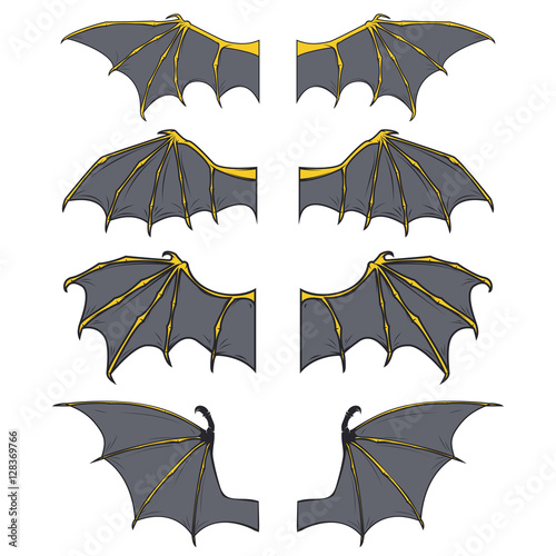 Set of dragon or bat wings in cartoon style isolated on white background. Vector illustration. 